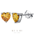 Ari Topaz Heart Stud Earrings 🧡