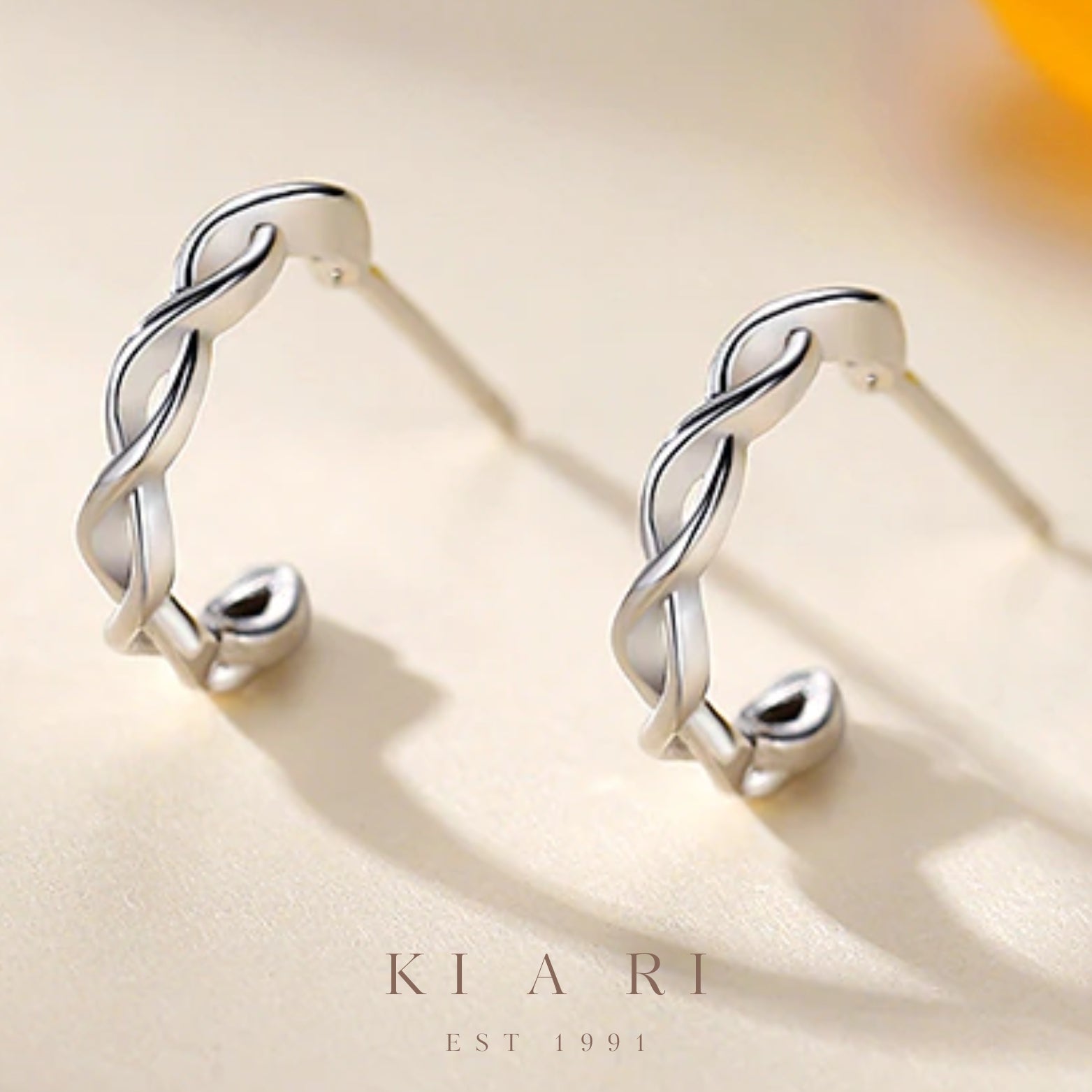 Sun Twisted Huggies Stud Earrings